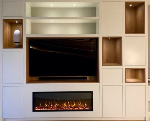 maatwerk wandkast met tvmeubel en haard in één.